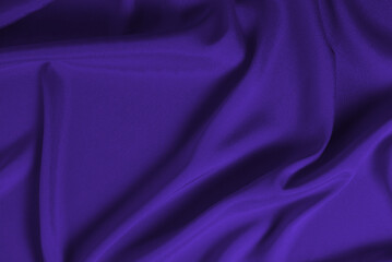 Rich and luxury red silk fabric texture background.