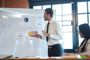 Smart man business coach speaker give presentation speaker presenter consulting reporting...