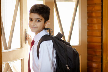 portrait of a student with school bag 