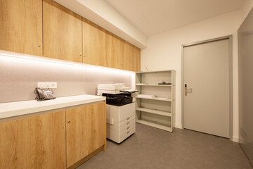 Copying and binding area in a professional office with file