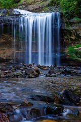 Wilke Glen and Cascade Falls in Osceola, Wisconsin during summer. Selective focus, background blur and foreground blur.  © Aaron J Hill