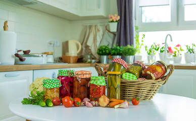 Jars with preserved vegetables for the winter. Selective focus.