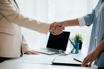 Close up of business person hands Employer interviewing job applicants, talking about resume and experience.