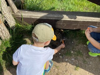 child playing in the garden