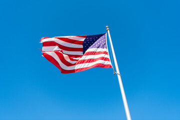 patriotic usa flag on blue sky background