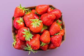 Fresh ripe delicious strawberries in bowl - healthy food and vegetarian