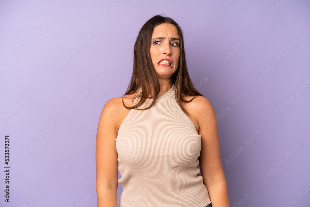 Wall mural hispanic pretty woman looking worried, stressed, anxious and scared, panicking and clenching teeth