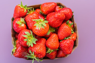 Fresh ripe delicious strawberries in bowl - healthy food and vegetarian