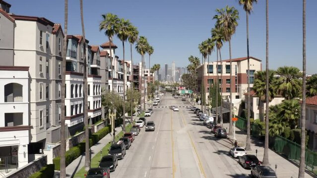 Lockdown Time Lapse Shot Of Cars Moving On Roads In Modern City Against Clear Sky -  Los Angeles, California