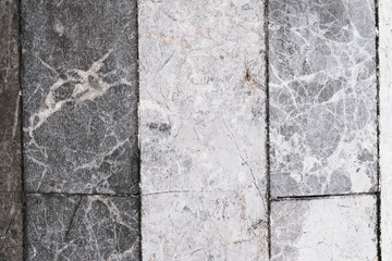 old weathered marble blocks, floor with stains and scratches, pattern and texture, colorful background, textured surface