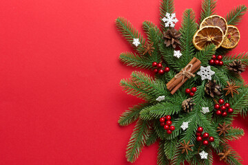 Christmas background with fir branches and Christmas decor. Top view, copy space for text