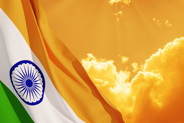 Waving India flag on sunset sky. Background with place for your text. Indian independence day, 15...