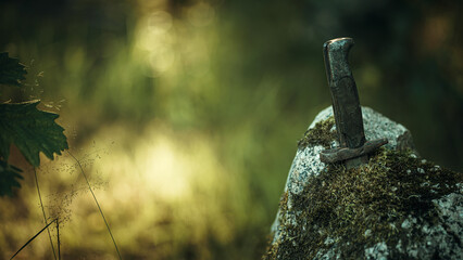 An old knife stuck in a granite stone.Artifacts of the last war.