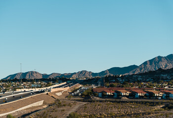 Fototapeta na wymiar Las Vegas suburb on a sunny day with mountains in the background
