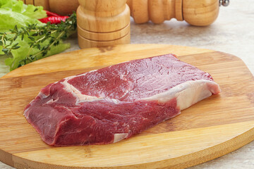 Raw rib-eye beef steak black angus