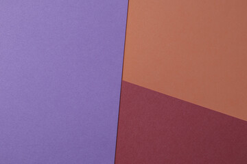 Purple, red and orange colored paper background. Abstract background from paper texture