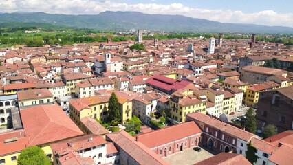 Fototapeta na wymiar Aerial view of Lucca cityscape in spring season, Tuscany - Italy