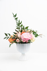 Beautiful fresh flower arrangement in a white vase