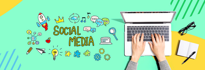 Social media with person using a laptop computer