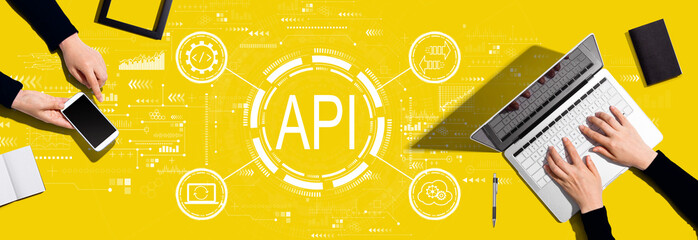 API - application programming interface concept with two people working together