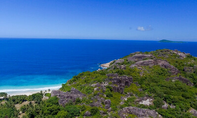 Fototapeta na wymiar Panoramic aerial view of Seychelles Island on a sunny day