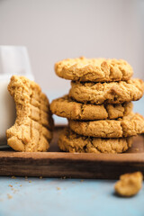 nutmeg nut butter chip cookies on wooden background glass milk