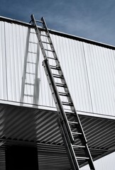 steel ladder on white corrugated sheet, 