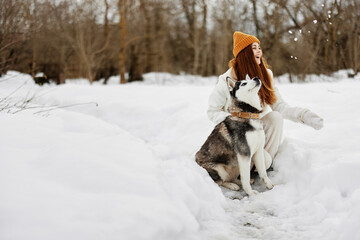 cheerful woman outdoor games snow fun travel winter holidays