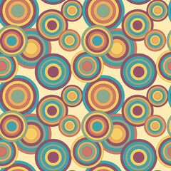 Colorful seamless circles pattern in hippie style in retro colors.
