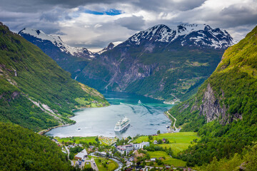 Above Geiranger fjord, ship and village, Norway, Northern Europe - obrazy, fototapety, plakaty
