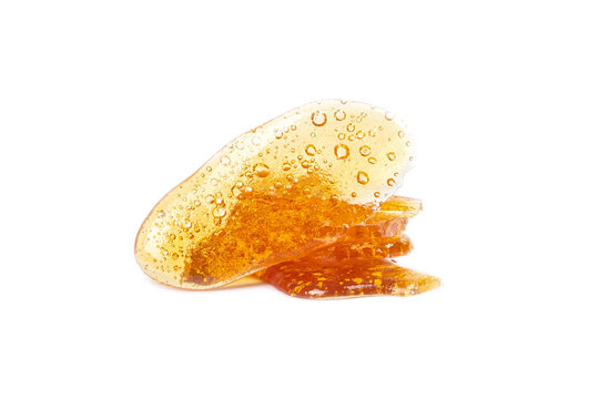 yellow cannabis wax resin isolated on white background.