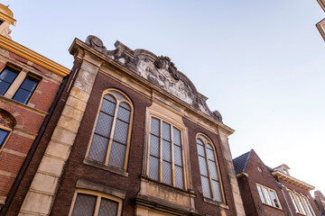 Fototapeta premium Street view and traditional Dutch buildings in the historic center of Utrecht, Netherlands