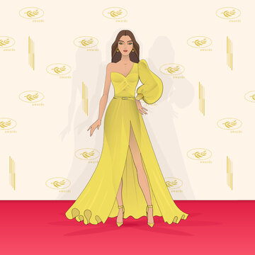 Woman Model In A Yellow Evening Dress On The Red Carpet. Mass Cultural Event, Award Ceremony. Place For A Photo Of The Participants Of The Event. Press Wall, Backstage.