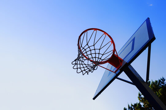 Basket in an outdoor playing field with clear sky