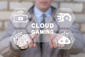 Gamer using virtual touchscreen presses the inscription: CLOUD GAMING. Concept of cloud gaming.