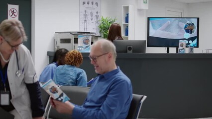 Female receptionist working at hospital reception desk in medical center, helping treat patients and make consultation appointments. Answering landline phone to discuss checkup visit. - Powered by Adobe