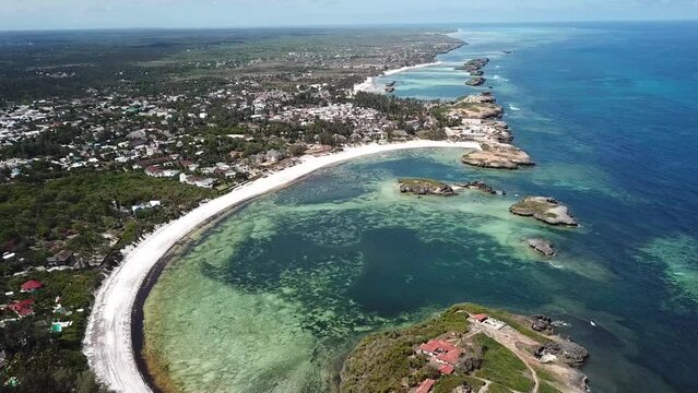 Watamu, Kenya. Beautiful coastal landscape of bay with sandy beaches and rocky formations in Kenyan travel destination - aerial