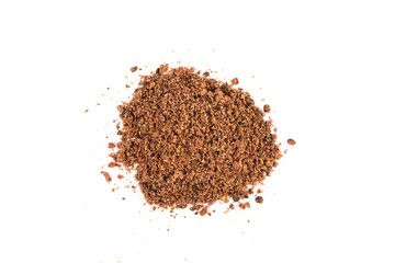 Ground multicolored sumac powder isolated over white top down