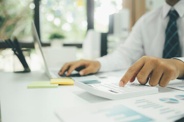 Businessman analyse investment marketing data.