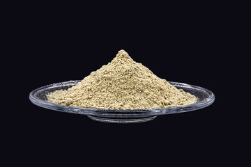 Indolebutyric acid, talc or rooting powder, thiamine sulfur, vegetable vitamin, fertilizer or fertilizer isolated on black background