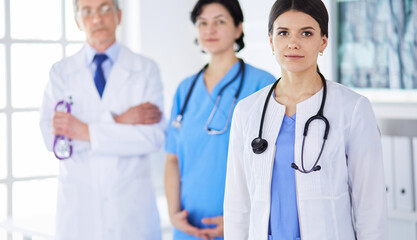 Fototapeta premium Group of doctors and nurses standing in the hospital Accident and Emergency department