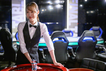 Image of a beautiful casino dealer.