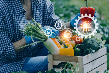 Futuristic businessman farms vegetables and crops using modern AI technology using mobile phones, temperature and humidity sensors, water tracking, climate control, holographic data data icons.