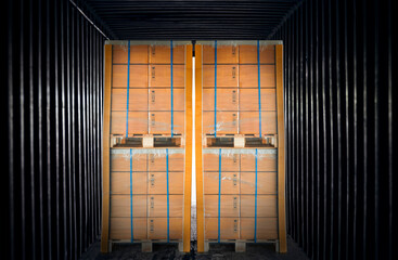 Packaging Boxes Stacked on Pallets in Cargo Container. Delivery Trucks. Supply Chain. Loading Cargo Shipment. Shipping Freight Truck Transport Logistics.	
