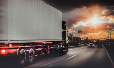 Fototapeta na wymiar Lorry Cargo Transport Delivery in motion, Motorway, Car truck driving on highway at sunset freight, with speed 