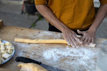 Making of Fresh Pumpkin Gnocchi by Female Hands