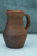       Ceramics, a ceramic product made with your own hands, made on a potter's wheel, a jug, a mug, clay.   