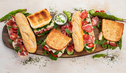 Various of club sandwiches and baguette.