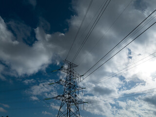 Aerial view of  Electricity network on cloudy background