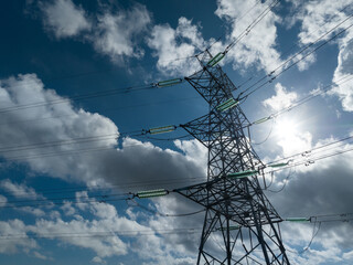 Aerial view of  Electricity network on cloudy background